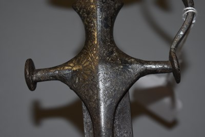 Lot 242 - A LATE 18TH OR EARLY 19TH CENTURY INDIAN TULWAR OR SWORD