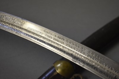 Lot 246 - AN EARLY 20TH CENTURY PRESENTATION INDIAN FRONTIER POLICE TULWAR OR SWORD