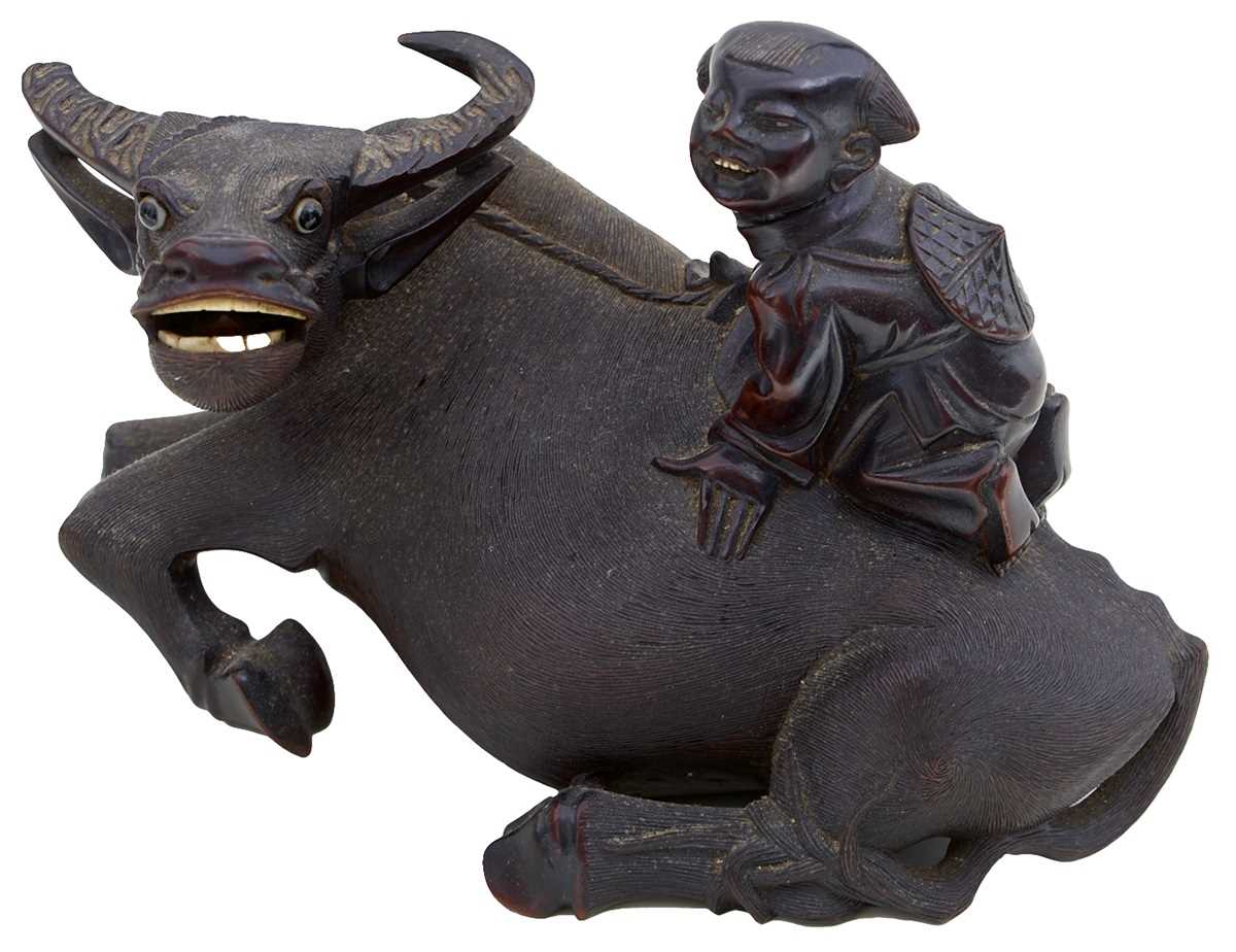 Lot 21 - AN EARLY 20TH CENTURY CHINESE CARVED HARDWOOD FIGURE