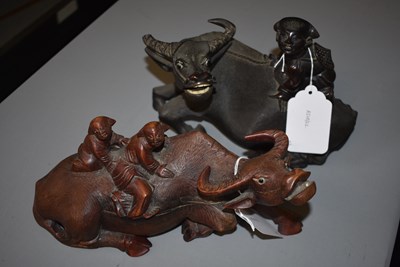 Lot 21 - AN EARLY 20TH CENTURY CHINESE CARVED HARDWOOD FIGURE