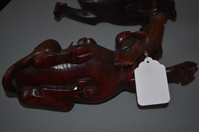 Lot 21 - AN EARLY 20TH CENTURY CHINESE CARVED HARDWOOD FIGURE
