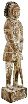 Lot 661 - A CARVED LIMED OAK FIGURE OF A KNIGHT