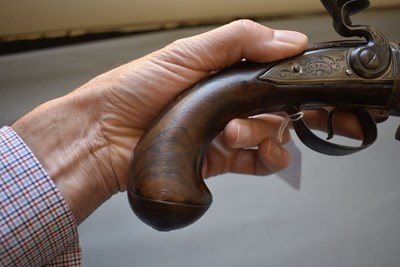 Lot 752 - A 25-BORE DOUBLE BARRELLED FLINTLOCK TURNOVER HOLSTER PISTOL BY WILSON