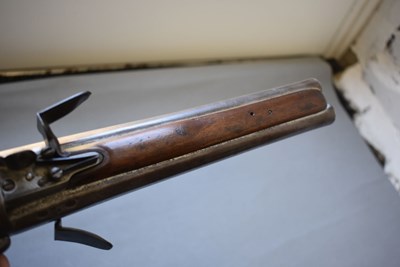 Lot 752 - A 25-BORE DOUBLE BARRELLED FLINTLOCK TURNOVER HOLSTER PISTOL BY WILSON