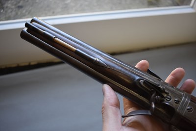 Lot 752 - A 25-BORE DOUBLE BARRELLED FLINTLOCK TURNOVER HOLSTER PISTOL BY WILSON