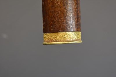Lot 90 - A 19TH CENTURY GOLD MOUNTED MALAYAN KRIS