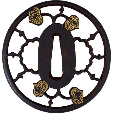Lot 17 - A CIRCULAR IRON SUKASHI TSUBA