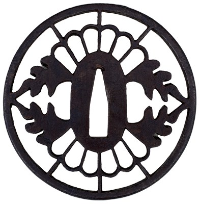 Lot 16 - A CIRCULAR IRON SUKASHI TSUBA