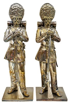 Lot 461 - MANNER OF EMMANUEL FREMIET: A PAIR OF SILVERED BRASS MODELS OF GRENADIER GUARDS