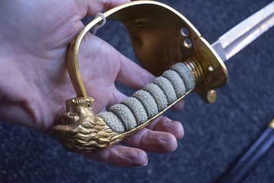 Lot 177 - A ROYAL NAVAL OFFICER'S SWORD