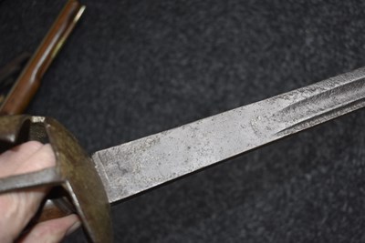 Lot 131 - AN 18TH CENTURY BRITISH MILITARY BASKET HILTED BACKSWORD