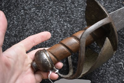 Lot 131 - AN 18TH CENTURY BRITISH MILITARY BASKET HILTED BACKSWORD