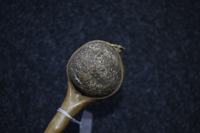 Lot 121 - A 19TH CENTURY AMERICAN PLAINS INDIAN STONE HEADED WAR CLUB