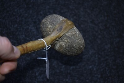 Lot 121 - A 19TH CENTURY AMERICAN PLAINS INDIAN STONE HEADED WAR CLUB