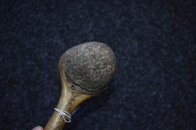 Lot 121 - A 19TH CENTURY AMERICAN PLAINS INDIAN STONE HEADED WAR CLUB