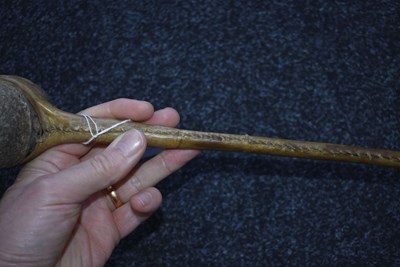 Lot 121 - A 19TH CENTURY AMERICAN PLAINS INDIAN STONE HEADED WAR CLUB