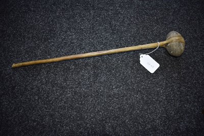 Lot 121 - A 19TH CENTURY AMERICAN PLAINS INDIAN STONE HEADED WAR CLUB