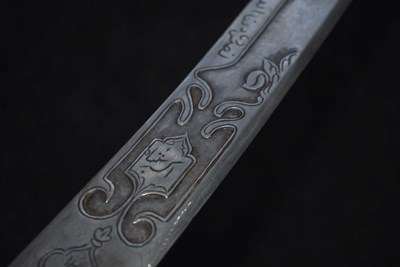 Lot 80 - AN 19TH CENTURY INDIAN TULWAR HILT