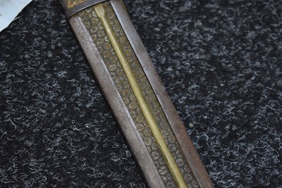 Lot 91 - A LATE 18TH OR EARLY 19TH CENTURY TIBETAN SHORT DPA'DAM OR SWORD
