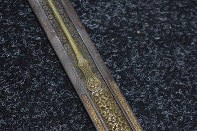 Lot 91 - A LATE 18TH OR EARLY 19TH CENTURY TIBETAN SHORT DPA'DAM OR SWORD