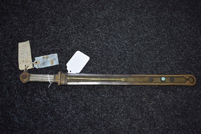 Lot 91 - A LATE 18TH OR EARLY 19TH CENTURY TIBETAN SHORT DPA'DAM OR SWORD