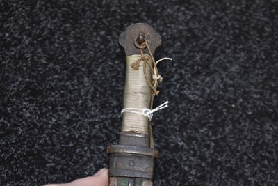 Lot 91 - A LATE 18TH OR EARLY 19TH CENTURY TIBETAN SHORT DPA'DAM OR SWORD