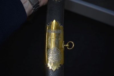 Lot 89 - AN INTERESTING 20TH CENTURY MIDDLE EASTERN SILVER HILTED PRESENTATION SABRE