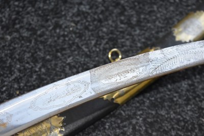 Lot 89 - AN INTERESTING 20TH CENTURY MIDDLE EASTERN SILVER HILTED PRESENTATION SABRE