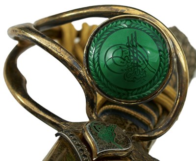 Lot 89 - AN INTERESTING 20TH CENTURY MIDDLE EASTERN SILVER HILTED PRESENTATION SABRE