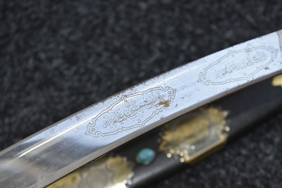 Lot 89 - AN INTERESTING 20TH CENTURY MIDDLE EASTERN SILVER HILTED PRESENTATION SABRE