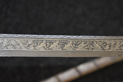 Lot 93 - A 19TH CENTURY BURMESE DHA