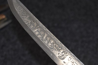 Lot 93 - A 19TH CENTURY BURMESE DHA