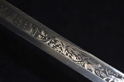 Lot 93 - A 19TH CENTURY BURMESE DHA