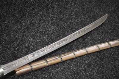 Lot 93 - A 19TH CENTURY BURMESE DHA