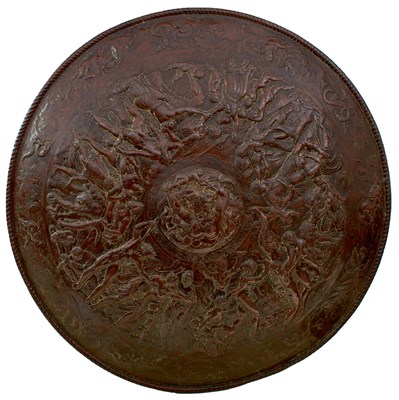 Lot 659 - AN ELKINGTON TYPE COPPER EMBOSSED SHIELD IN THE CLASSICAL MANNER