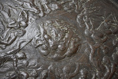 Lot 659 - AN ELKINGTON TYPE COPPER EMBOSSED SHIELD IN THE CLASSICAL MANNER