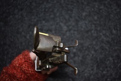 Lot 387 - AN 18TH CENTURY FLINTLOCK TINDER LIGHTER