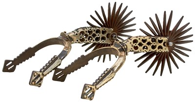 Lot 416 - A PAIR OF 19TH CENTURY CHILEAN GAUCHO OR COWBOY ROWEL SPURS