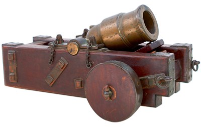 Lot 665 - AN EARLY 19TH CENTURY MODEL OF A COEHORN MORTAR AND CARRIAGE