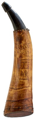 Lot 509 - A CARVED HORN POWDER HORN
