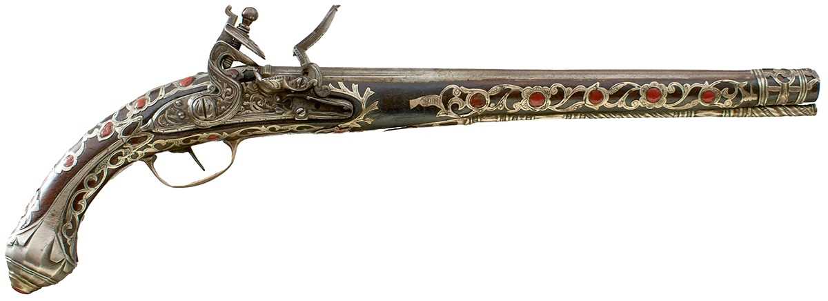 Lot 106 - A SCARCE 18-BORE SILVER AND CORAL MOUNTED ALGERIAN FLINTLOCK HOLSTER PISTOL