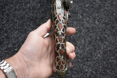 Lot 106 - A SCARCE 18-BORE SILVER AND CORAL MOUNTED ALGERIAN FLINTLOCK HOLSTER PISTOL
