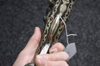 Lot 106 - A SCARCE 18-BORE SILVER AND CORAL MOUNTED ALGERIAN FLINTLOCK HOLSTER PISTOL