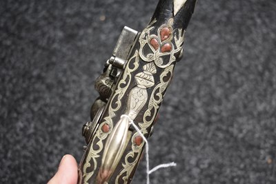 Lot 106 - A SCARCE 18-BORE SILVER AND CORAL MOUNTED ALGERIAN FLINTLOCK HOLSTER PISTOL