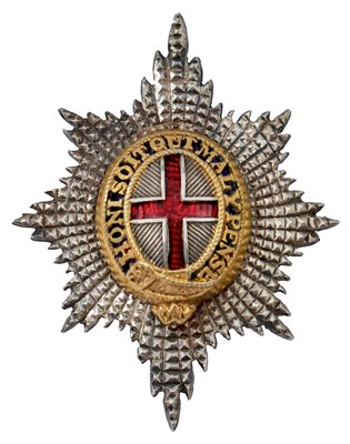 Lot 596 - A COLDSTREAM GUARDS OFFICER'S WHITE METAL CAP BADGE