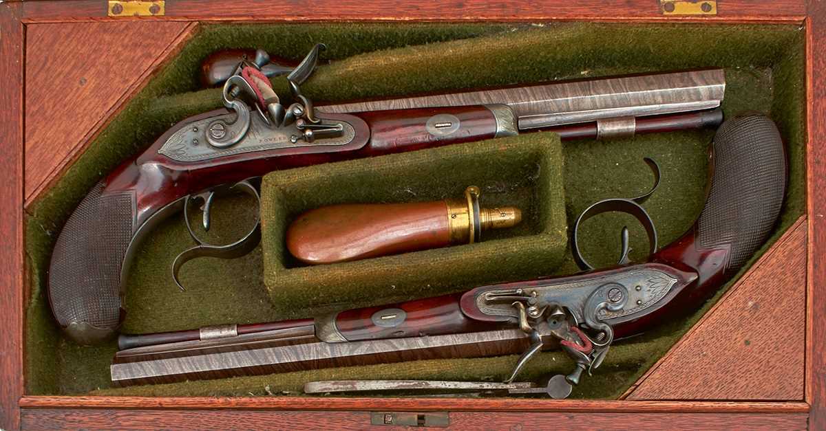 Lot 310 - A CASED PAIR OF 25-BORE IRISH FLINTLOCK DUELLING PISTOLS BY THOMAS FOWLER OF DUBLIN