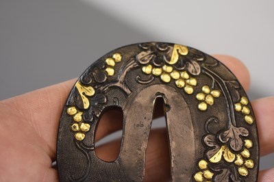 Lot 17 - AN OVAL SHAKUDO GOTO SCHOOL TSUBA