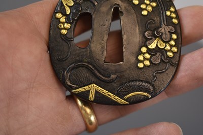 Lot 17 - AN OVAL SHAKUDO GOTO SCHOOL TSUBA