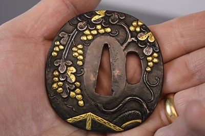 Lot 17 - AN OVAL SHAKUDO GOTO SCHOOL TSUBA