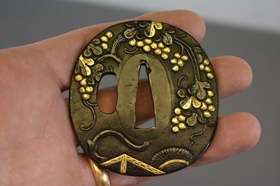 Lot 17 - AN OVAL SHAKUDO GOTO SCHOOL TSUBA